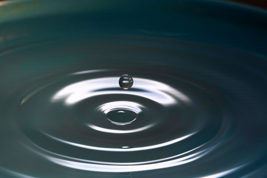 water drop ripple meditation photo