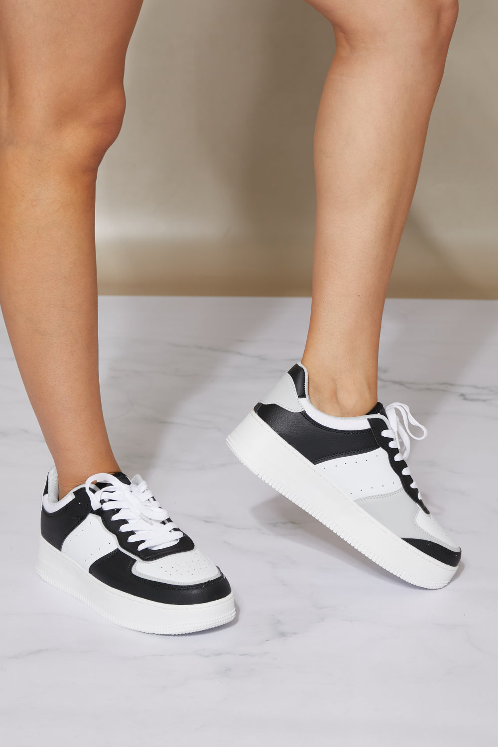 Berness Mile a Minute Platform Sneakers in Black and White Trendsi
