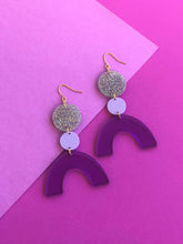 Load image into Gallery viewer, Discotheque purple, silver glitter rainbow geometric acrylic earrings are fun and will make you feel happy and cheerful, while adding the perfect pop of color to your wardrobe! Our colorful, eighties inspired earrings are handmade and designed with love in Las Vegas and like totally, make a statement! 