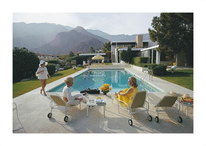 Image of Catch Up By The Pool, C-Type Print artwork by Slim Aarons, free delivery