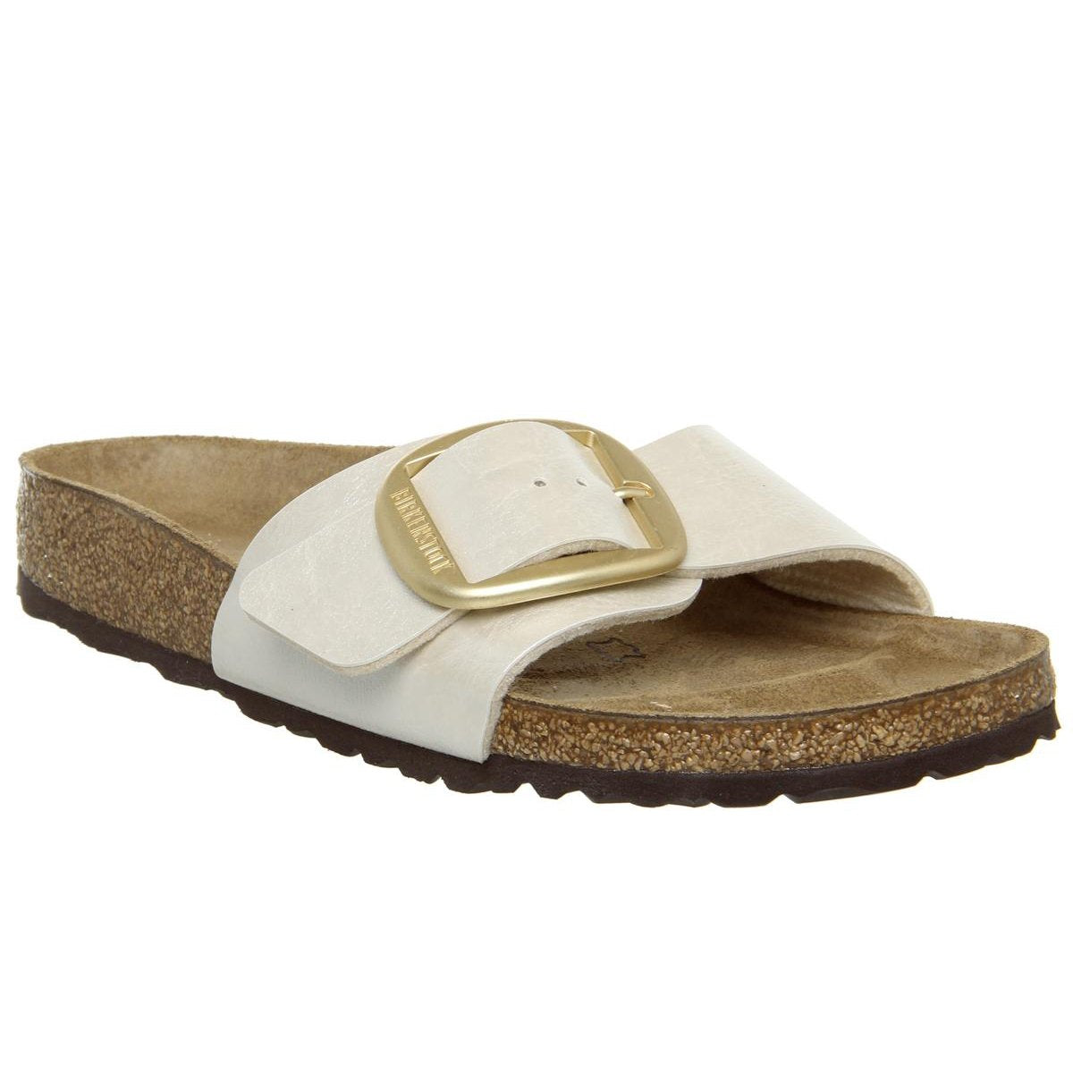 white birkenstocks with gold buckles