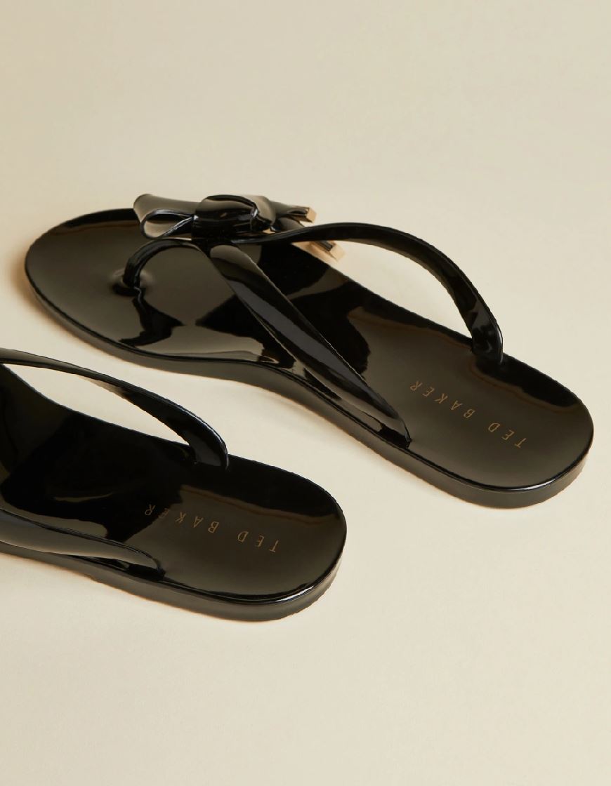 luzzi bow detail flip flops