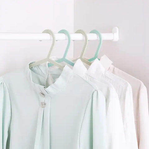 green plastic clothes hangers