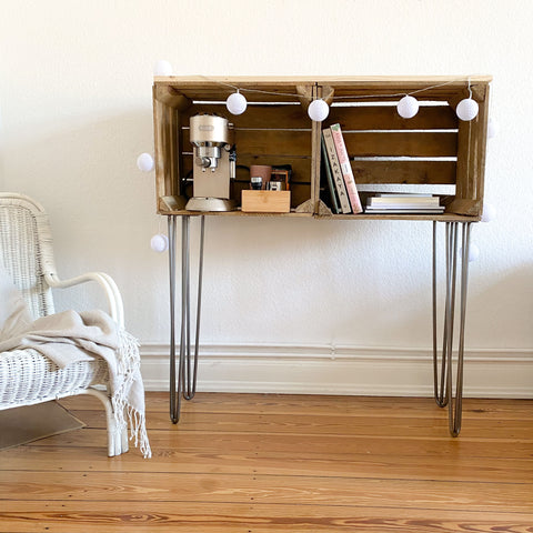 Chest of drawers and hairpin coffee-apple boxes-chair-old building shelf