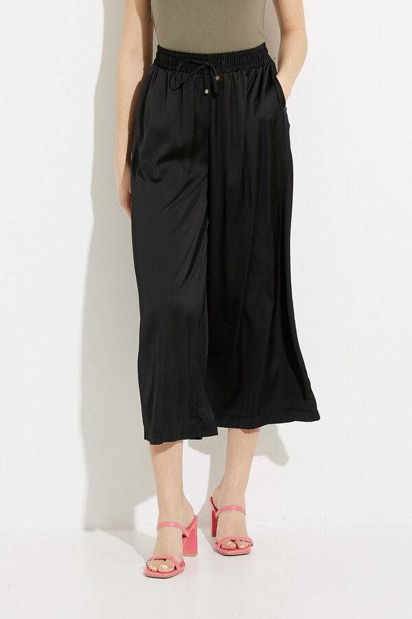 High-rise silk-blend flared pants in black - Joseph