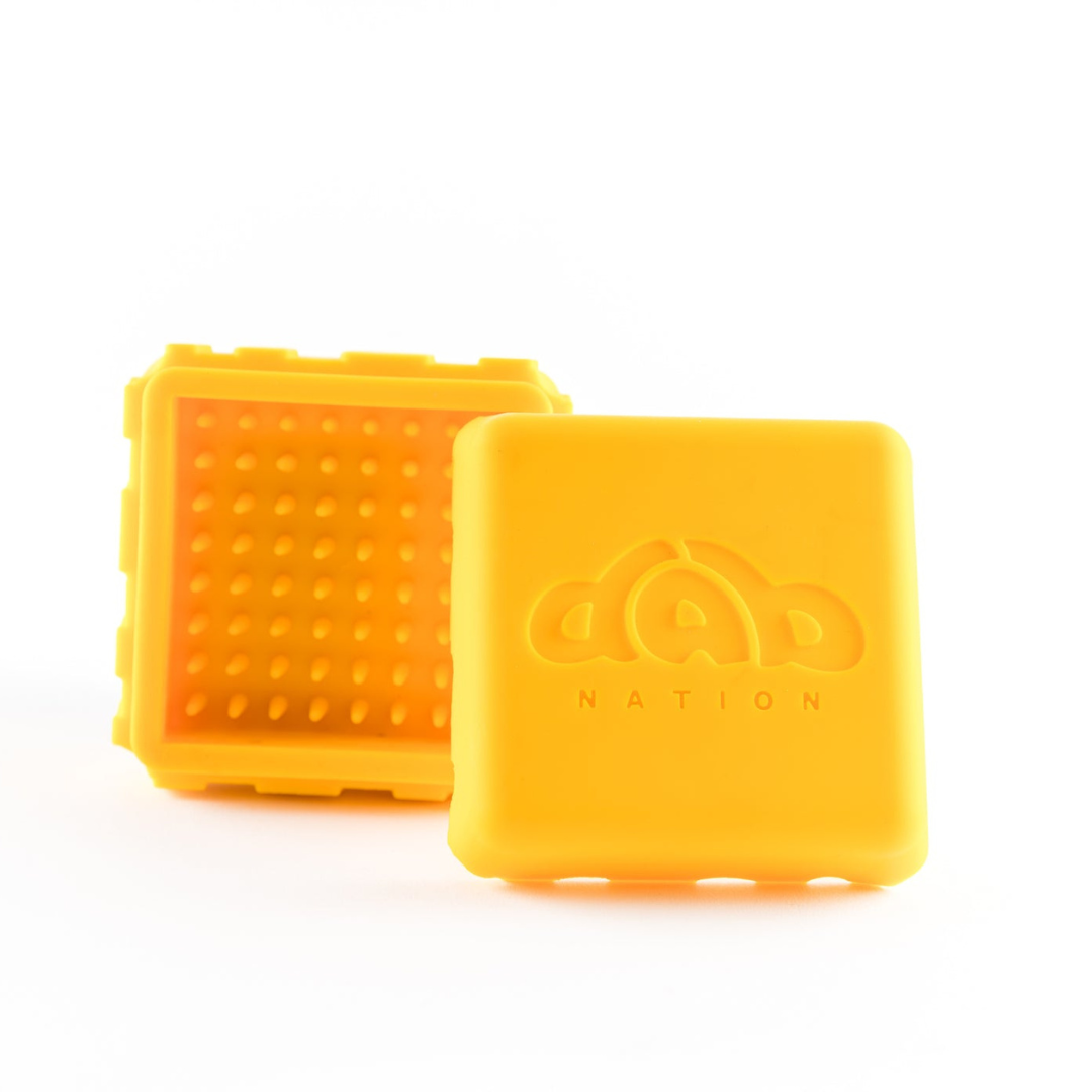https://cdn.shopify.com/s/files/1/0268/8421/0734/products/dab-nation-silicone-banger-saver-gold.png?v=1668474043&width=1080
