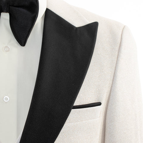 A peak lapel on a tuxedo.