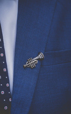 A Crystal Embedded Trumpet Lapel Pin