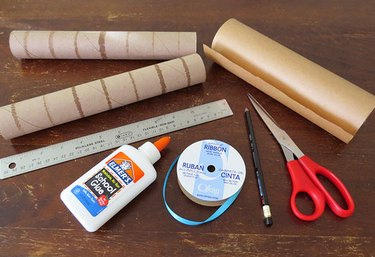 Story Scrolls bookish crafts for kids including scissors, papers, glue and, other things.