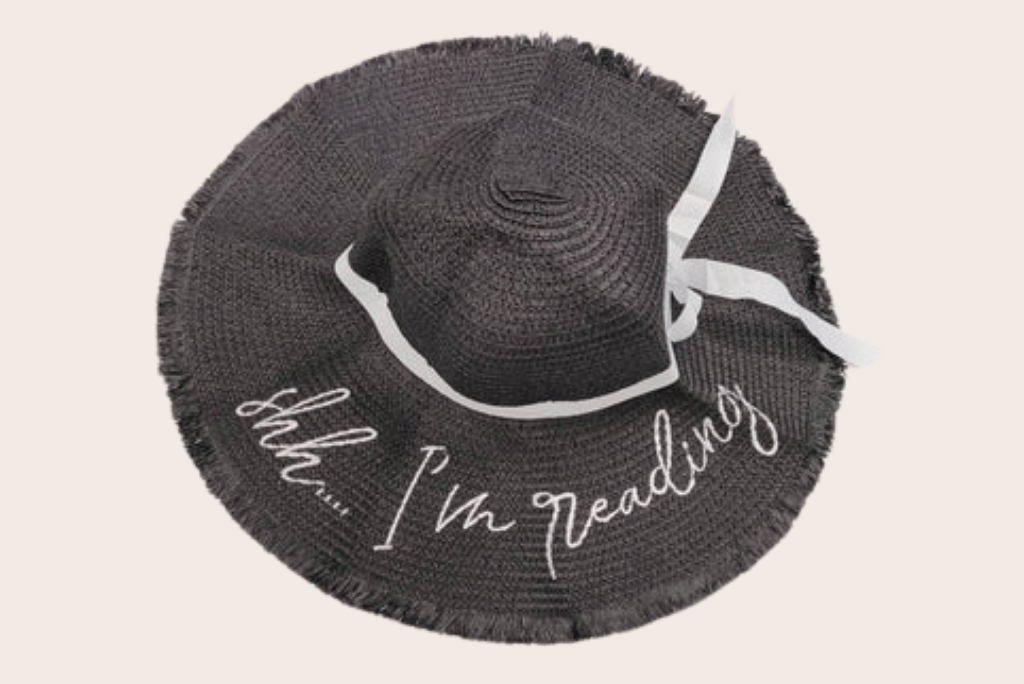 A sun hat with "Shh... I'm reading" embroidered on the brim.