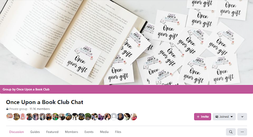 Screenshot of a social media page for 'Once Upon a Book Club Chat', a private group with 11k members. The banner image displays an open book with readable text, alongside several cards with 'Open your gift' written in decorative script, suggesting interactive reading activities or gift exchanges within the book club community.