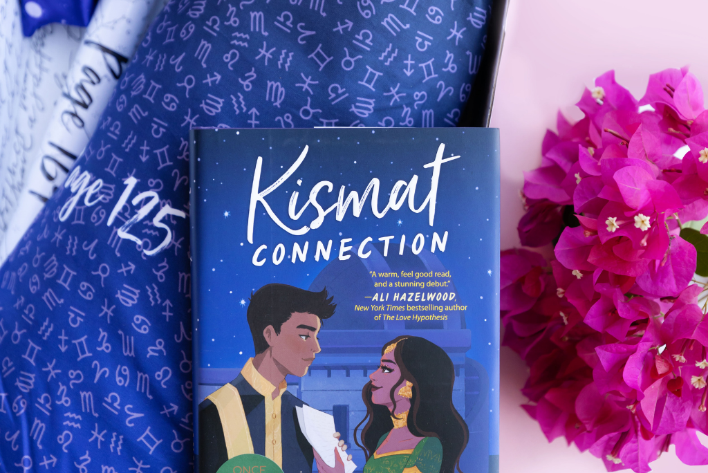 OUABC 'Kismat Connection' book with gift wrapping items.