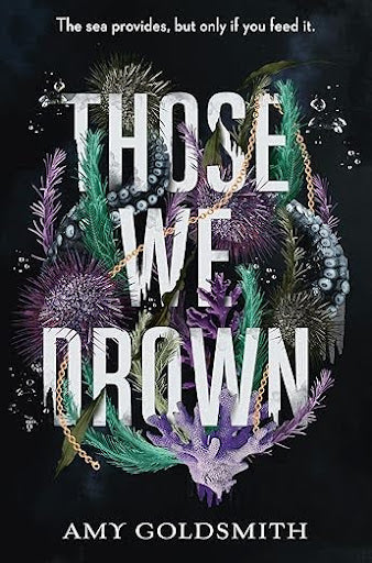 Book cover of "Those We Drown" by Amy Goldsmith. The dark background features an intricate design of sea flora and fauna, including urchins, seaweed, and an octopus, surrounding bold, golden text of the title, encapsulating themes of marine mystery.