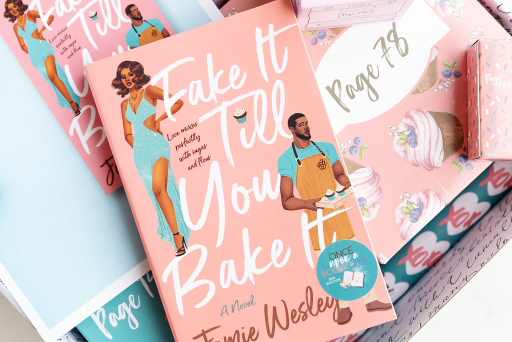 Novel titled "Fake It Till You Bake It" by a OUABC book club, with illustration.