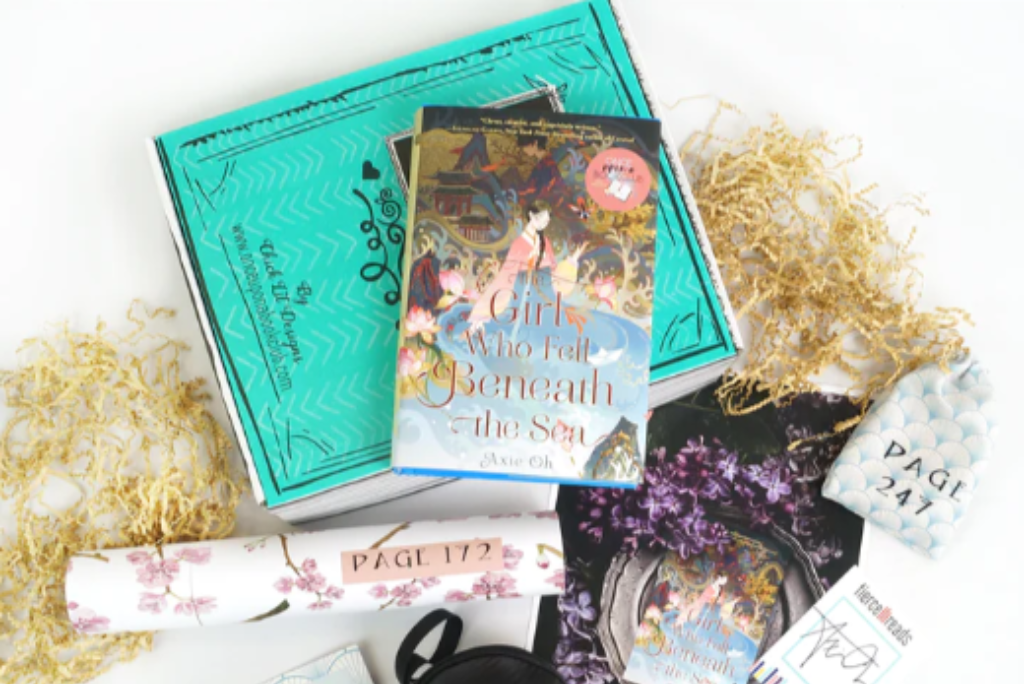 OUABC book subscription box featuring The Girl Who Fell Beneath the Sea by Axie Oh