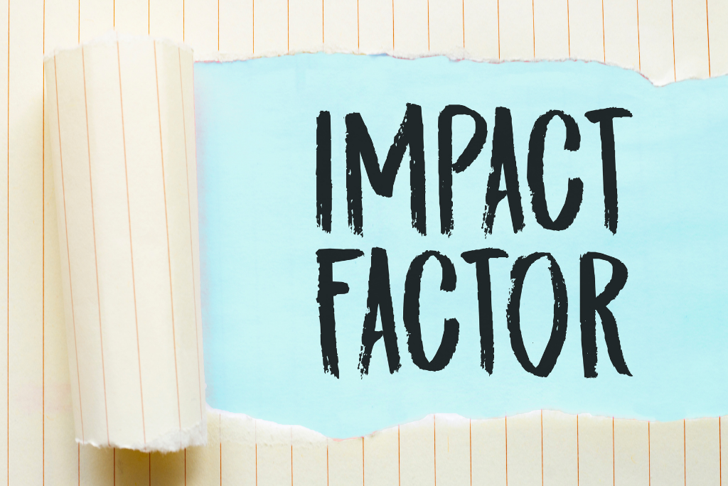 The words "IMPACT FACTOR" written on a torn paper, placed over a blue background.