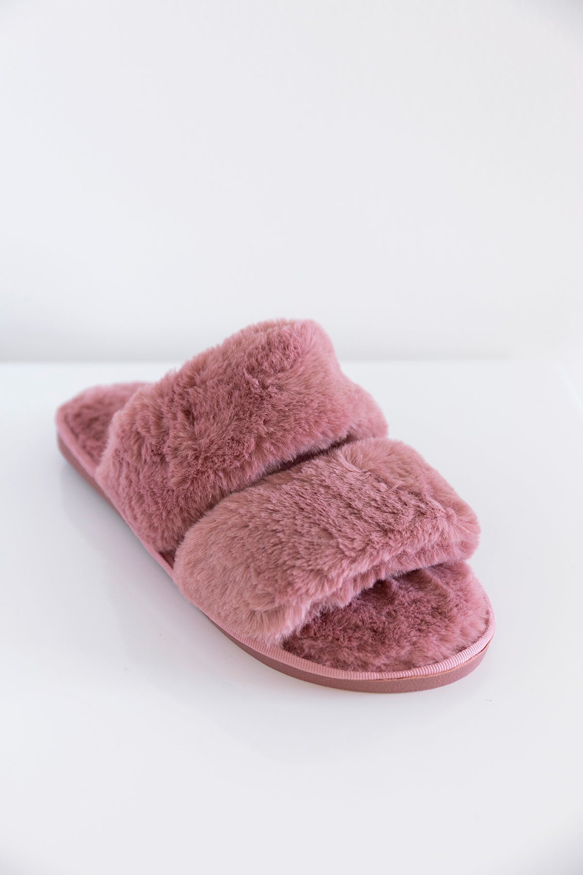 light pink fuzzy slippers