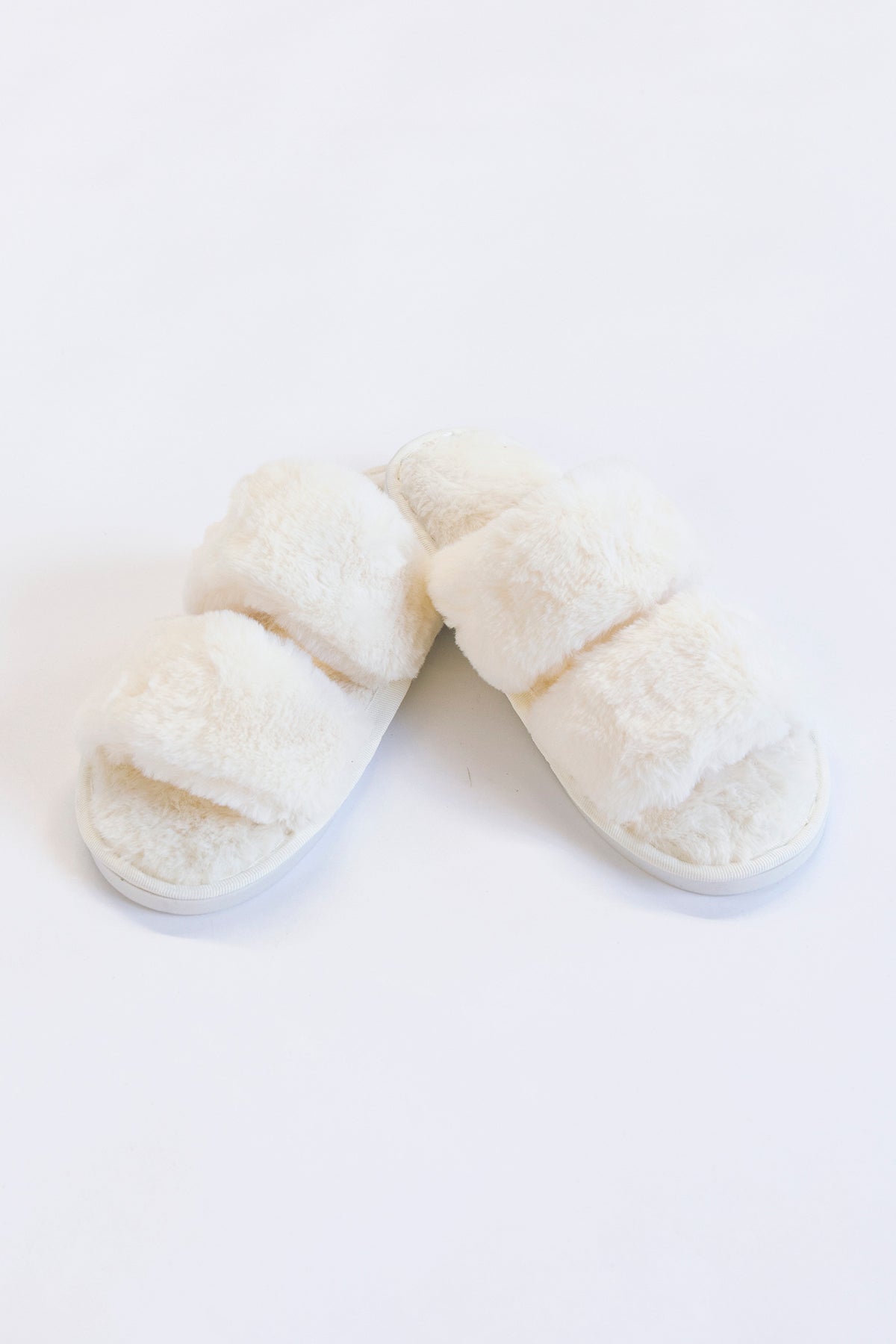 white fuzzy slippers