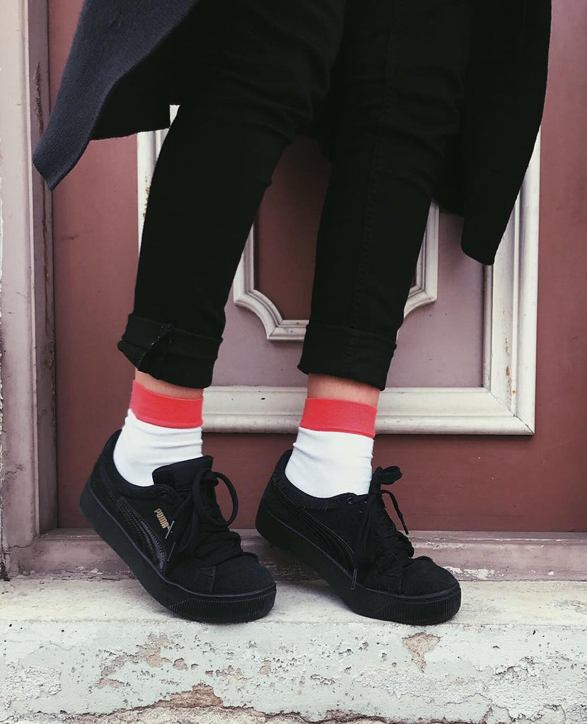 black sneakers with white socks