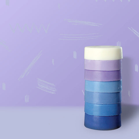 Stack of blue and purple bars of Bubz breastmilk soap