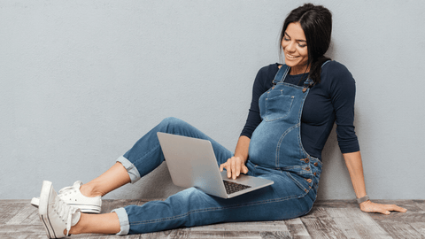 pregnant woman on laptop