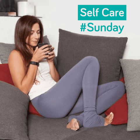 Self-Care Sunday - Woman relaxing on couch