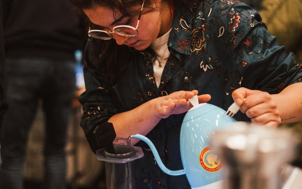 Competitor pouring with the Limited Edition WAC Gooseneck Artisan Kettle.