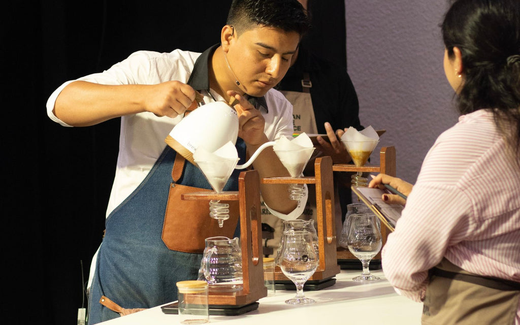 Yamil Quino Zapata competes in Brewers Cup with the Artisan Electric Gooseneck Kettle in Pearl White.