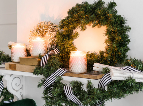 Holiday wreath, ribbons and scented candles for your foyer at home this Christmas