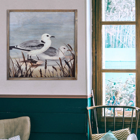 Vintage-style wooden wall art representing seagulls by the sea