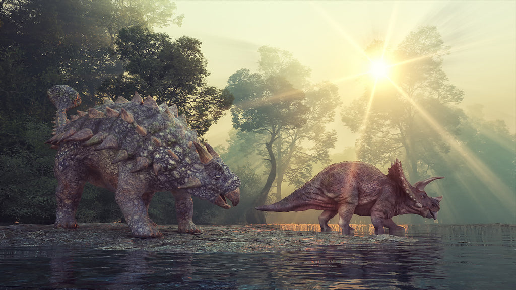 Dinosaures devant une source d'eau