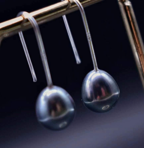 pair of black pearl earrings