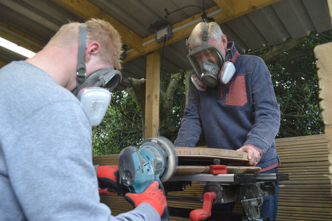 Father and son workshop experience sanding
