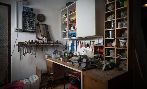 Workstation with shelves inside a garage