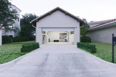 White garage with an exceedingly long driveway