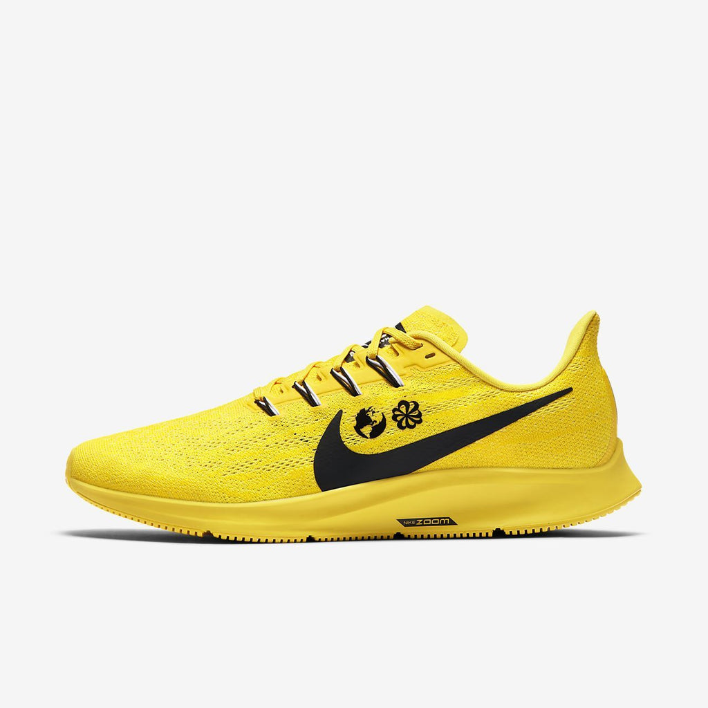 yellow nike running shoes