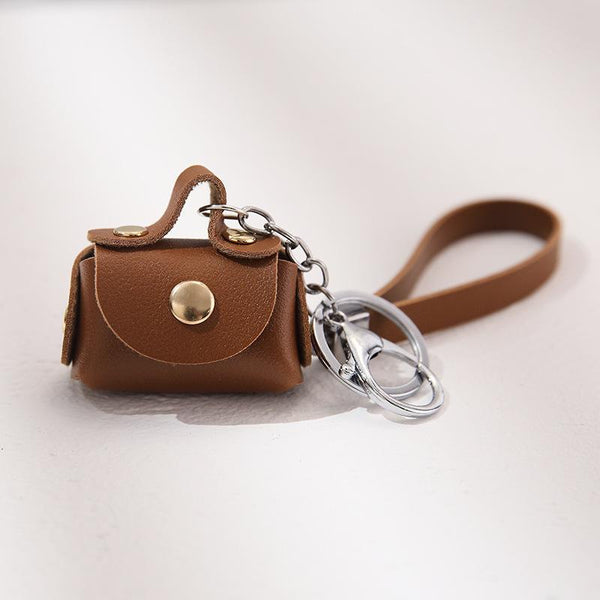 Coach Mini Pouch Keychain, Women's Fashion, Bags & Wallets, Wallets & Card  Holders on Carousell