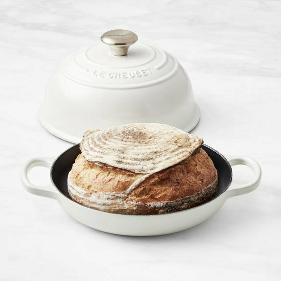 https://cdn.shopify.com/s/files/1/0269/2294/2529/products/le-creuset-stoneware-bread-oven-1-c_1024x1024.jpg?v=1648677037