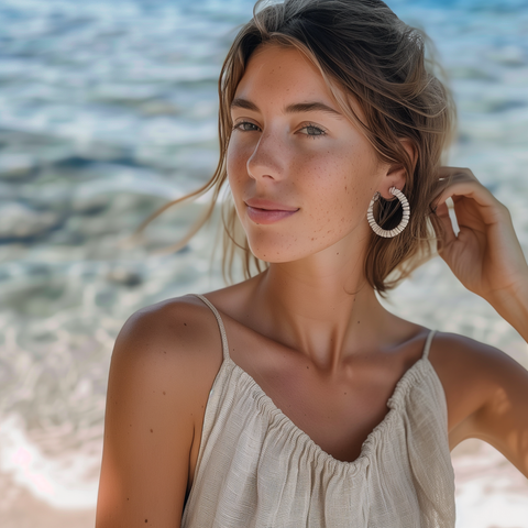 BEADED HOOP EARRINGS WOMAN AT THE BEACH