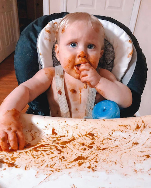 Baby Makes Mess While Feeding Himself Spaghetti 