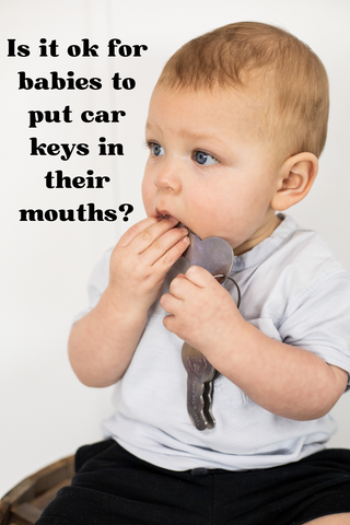 Baby puts keys in his mouth