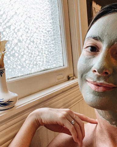 erin from oxalis apothecary in a mud mask 