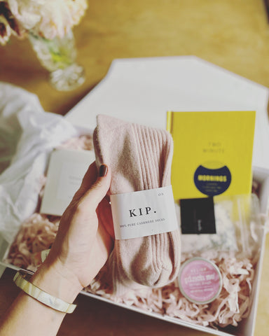 picture of a gift box including cashmere socks