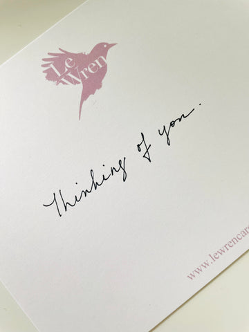 picture of a Le Wren notecard with the words "thinking of you" written in cursive