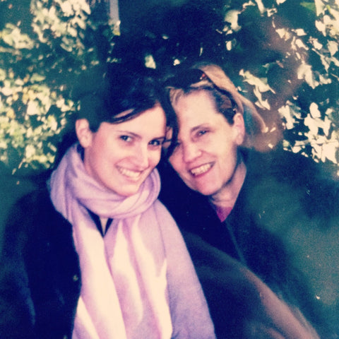 picture of a mother and daughter in front of trees