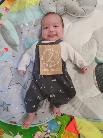 Baby Grayson celebrating 2-months 2