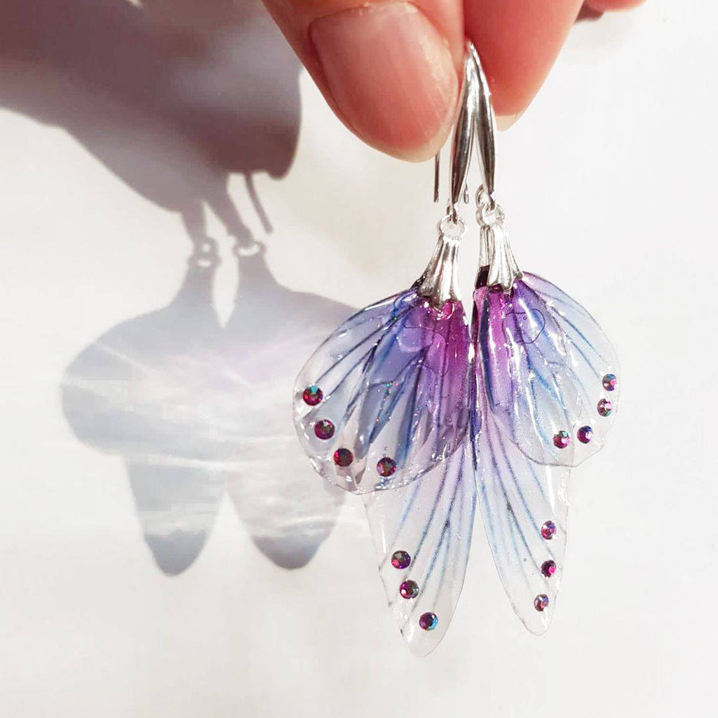 purple color angel wing earrings