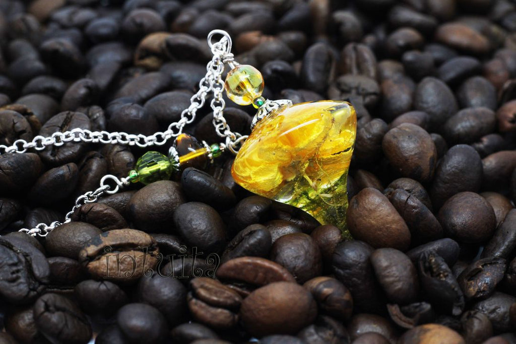 Yellow real flower and resin pendant