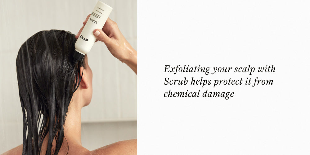 woman using Arey Scrub scalp exfoliation product in shower