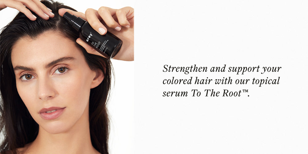 woman using Arey To The Root scalp serum
